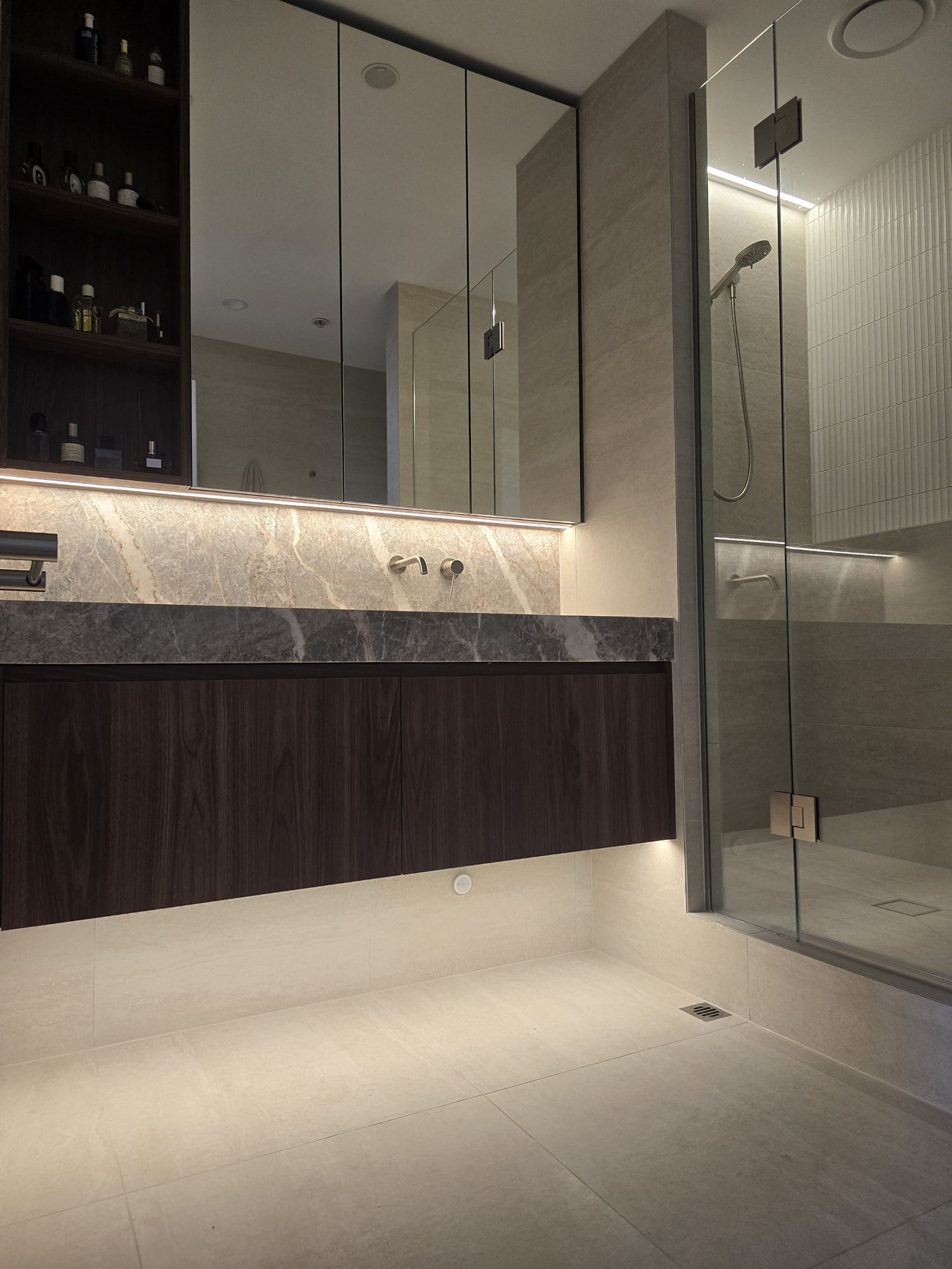 Luxury ensuite with feature LED strip lighting